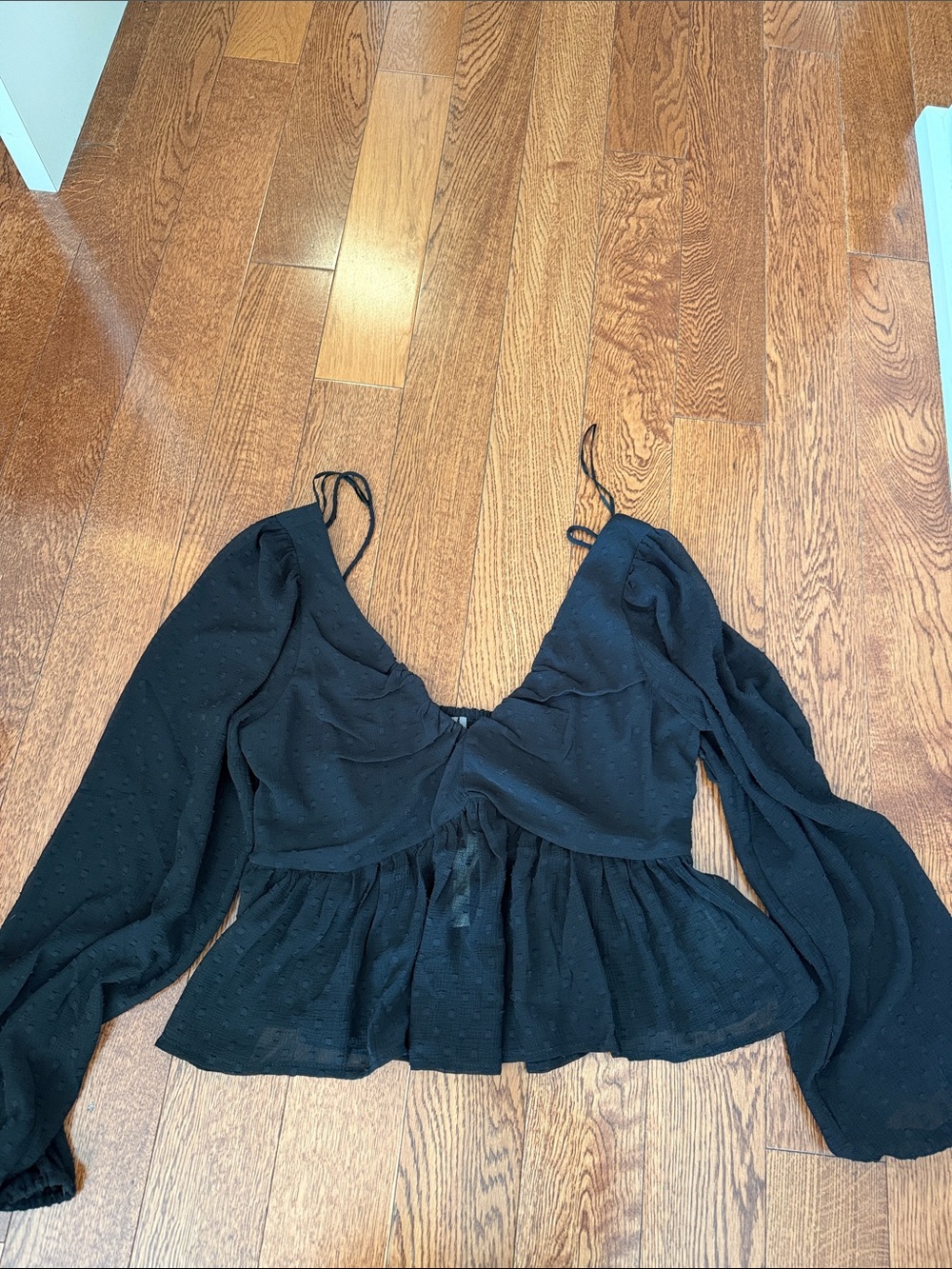 Anthropologie Black Peplum V-Neck Blouse with Sheer Dot Texture